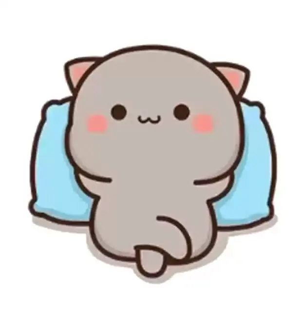 Goma the gray cat is relaxing on a blue pillow. The cute cat closes its eyes, ready for a nap.