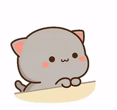 Goma the cat is resting on a table, with closed eyes and a cute expression. A small heart floats beside Goma, adding to the overall adorable scene.