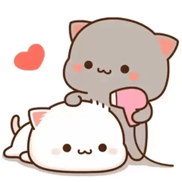 A grey cat is drying the fur of a white cat. The two cats are enjoying some quality time together. The gray cat uses a pink hair dryer.